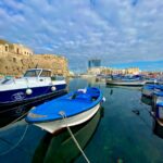 a bunch of boats that are sitting in the water