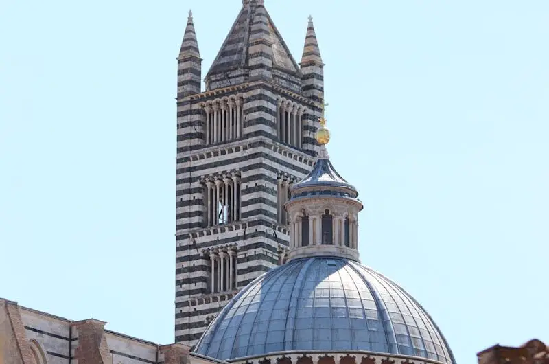 a tall building with a dome on top of it