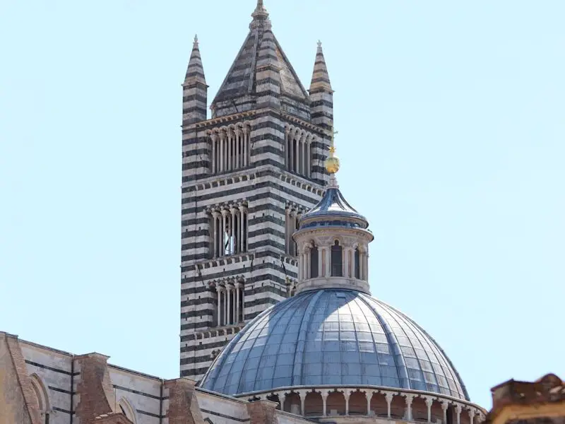 a tall building with a dome on top of it
