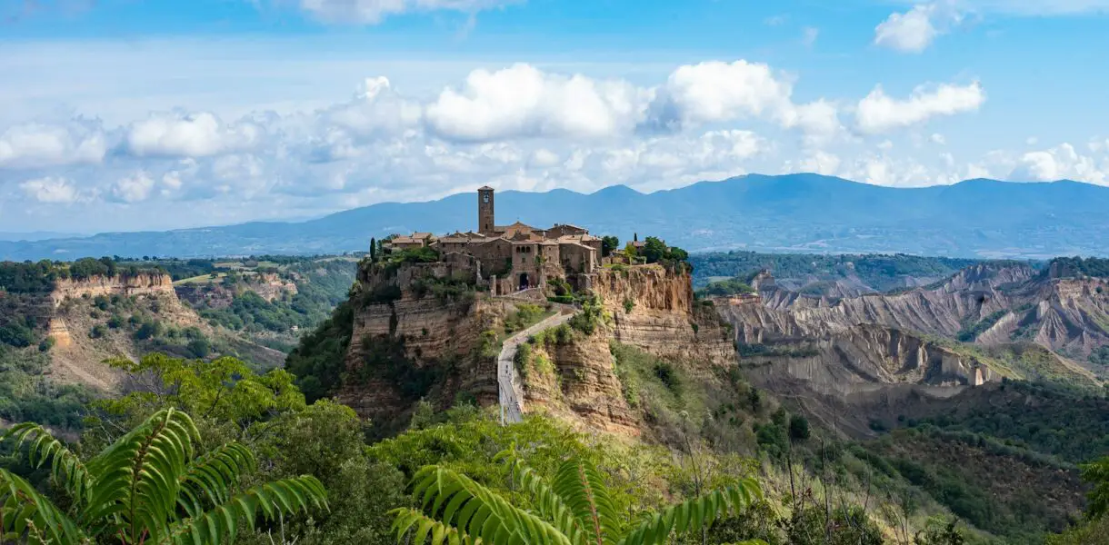 A view of a mountain with a castle on top of it