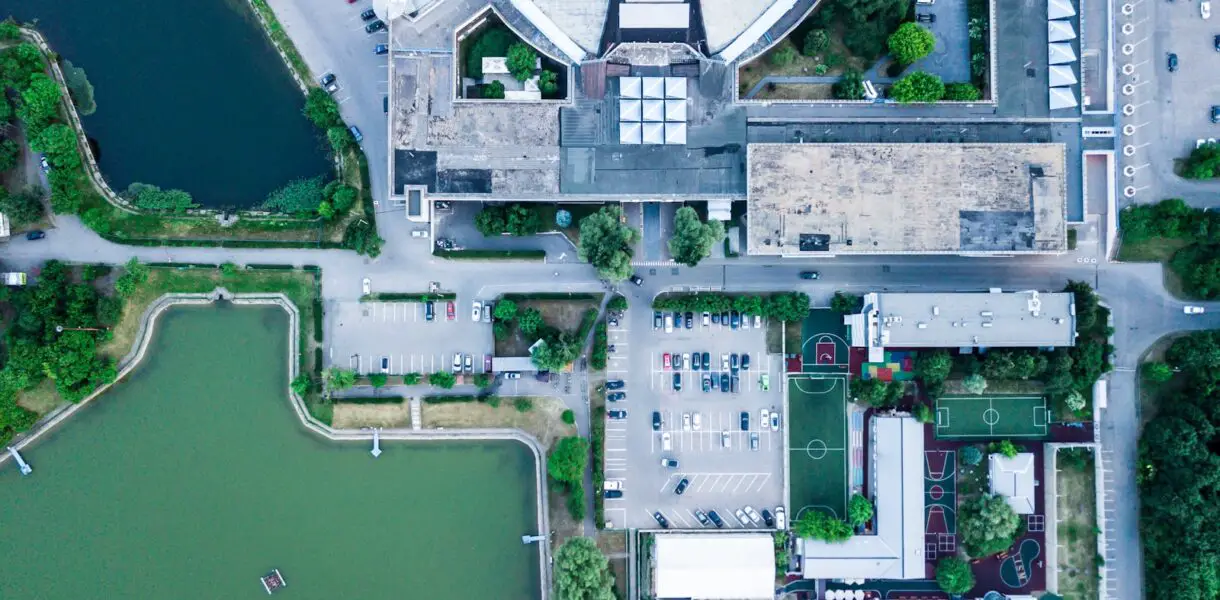 aerial photo of house near body of water
