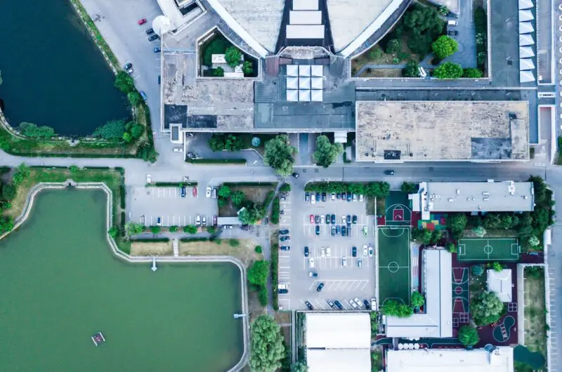 aerial photo of house near body of water